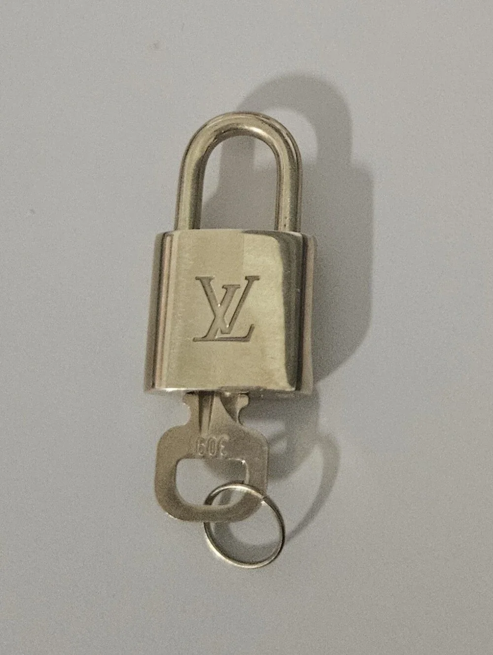 Louis Vuitton Padlock & Key Set